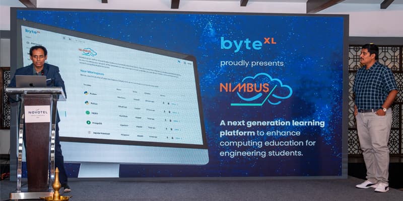 Karun Tadepalli and Sricharan Tadepalli presenting NIMBUS platform features, AiGenda 2024
